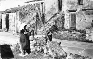 BR53530 Ile d oleron villageoise au vieux puits        France