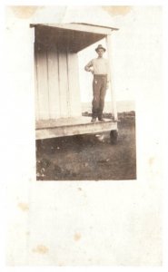 Man Farmer Stands on Porch in  RPPC Postcard c1900s