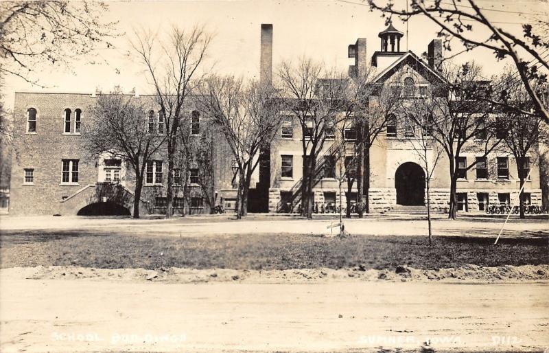 Sumner Iowa~School Buildings~Full Bicycle Racks in Front~Bell Tower~1940s RPPC