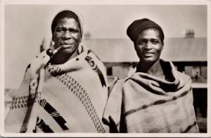 Portrait of Two Men Africa 'Native First Aid' Pin Cigar Pipe RPPC Postcard E34