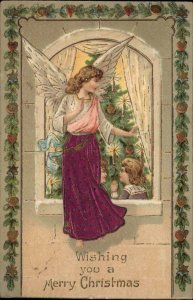 Christmas Angel Watches Children Through Window c1910 Vintage Postcard