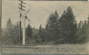 C-1910 RPPC Photo Postcard Railroad crossing warning sign 491