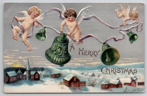 Christmas Greetings Cherubs With Bells Above Snow Covered Town Postcard S26