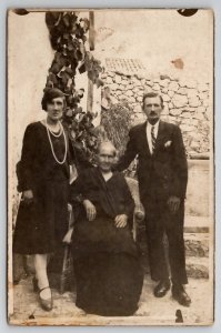 RPPC Lovely European Family Old Woman Postcard C24