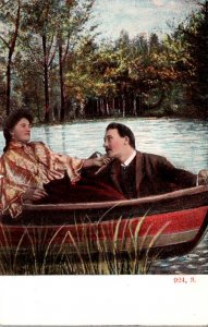 Romantic Couple In Rowboat
