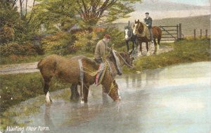 Waiting their turn. Horses and riders Nice old vintage English postcard