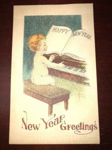 Vintage Happy New Year Greeting Piano Baby Postcard