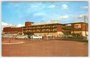 1960's ELKO NEVADA STOCKMEN'S MOTOR HOTEL CLASSIC CARS TRUCKS VINTAGE POSTCARD