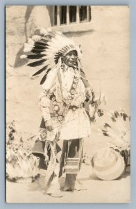 AMERICAN INDIAN CHIEF in PARADE DRESS ANTIQUE REAL PHOTO POSTCARD RPPC