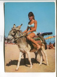 486032 Bulgaria Varna Golden Sands girl on a donkey in a bathing suit Old