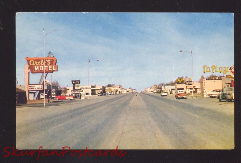 TUCUMCARI NEW MEXICO ROUTE 66 1950's CARS DOWNTOWN STREET SCENE POSTCARD