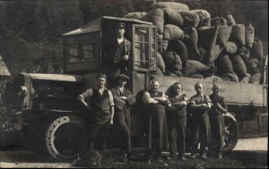 Early European Truck Filled w/ Sacks Men Working c1910 Real Photo Postcard