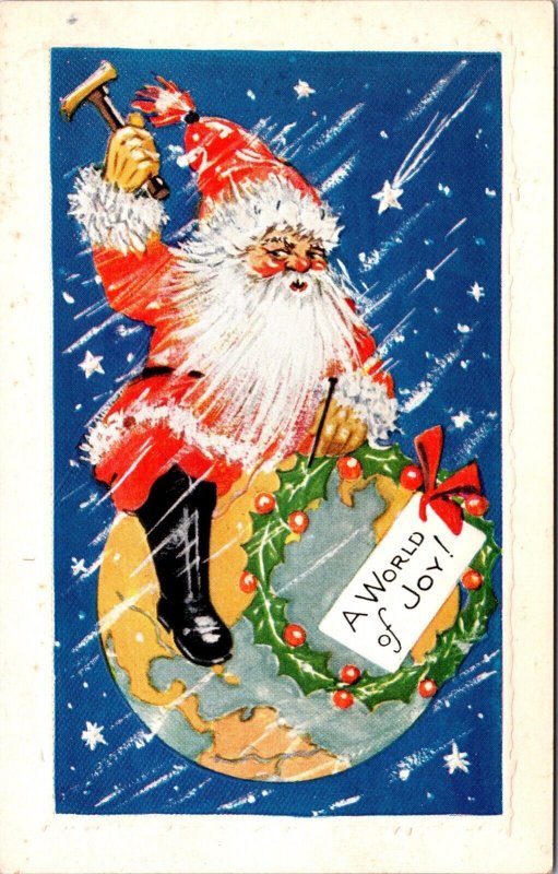 Christmas PC Santa Claus Sitting on World Globe Nailing Holly Wreath to Earth