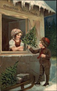 Little Boy Brings Girl Christmas Tree c1910 Vintage Postcard