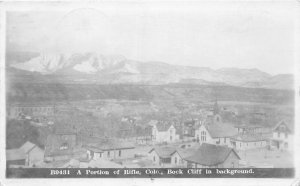 H21/ Rifle Colorado RPPC Postcard c1916 Book Cliff Homes Church School