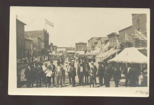 RPPC SIOUX RAPIDS IOWA DOWNTOWN STREET SCENE CARNIVAL REAL PHOTO POSTCARD