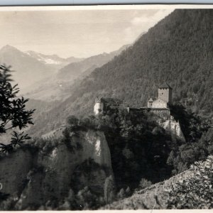 c1940s Tirol, Italy RPPC Alpine Castle Mountain Cliff Fort Medieval Tower A362