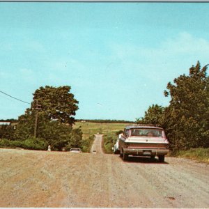c1960s Moncton NB Magnetic Hill Postcard Optical Illusion Station Wagon Car Sign