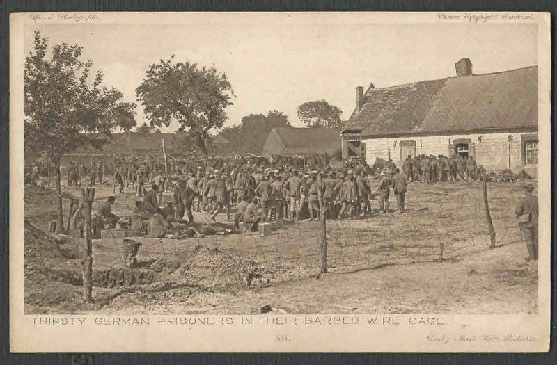 Ca 1916 RPPC* WW1 THIRSTY GERMAN PRISONERS IN THEIR BARBED WIRE CAGE SEE INFO