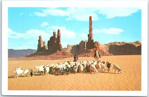 Postcard - Navajo Women, Taking their sheep to water in Monument Valley