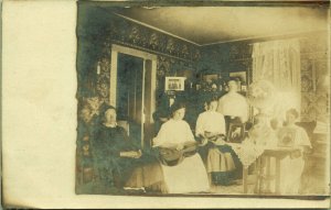 RPPC Women in Parlor interior Guitar Piano early 1900's Real Photo Postcard