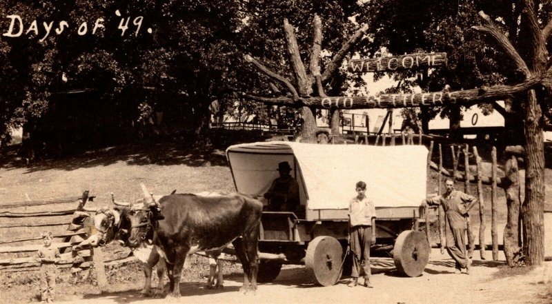 c1910 RPPC Welcome Old Settlers Days Of '49 Ox Drawn Covered Wagon Clinton Iowa