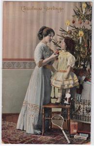 Mother & Daughter Decorating Christmas Tree