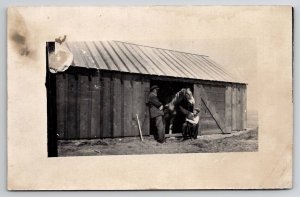 RPPC Two Men With Horse at Barn c1908 Real Photo Postcard J30