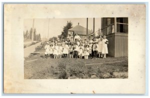 c1910's Children Holding Pennants Scene Street RPPC Photo Antique Postcard