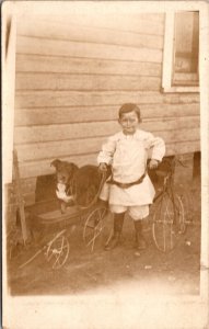 Real Photo Postcard Little Boy with a Tricycle and Dog Sitting in a Wagon