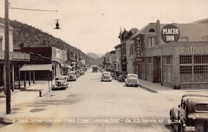J83/ Idaho Springs Colorado RPPC Postcard c1940s Main Street Stores 491