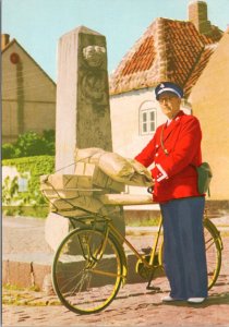 Postcard Denmark - Postman with bicycle by old milestone