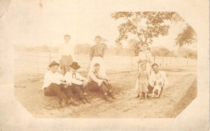 c1908 RPPC Real Photo Postcard Young Families Dirt Road Fence