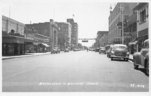 J77/ Billings Montana RPPC Postcard c1940-50s Broadway Stores Autos  16
