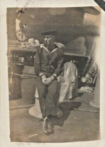 SAILOR IN UNIFORM ON DOCK-1910s TRIMMED REAL PHOTO POSTCARD