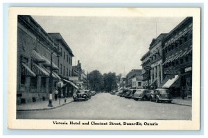 c1920s Victoria Hotel and Chestnut Street, Dunnville Ontario Canada CA Postcard 