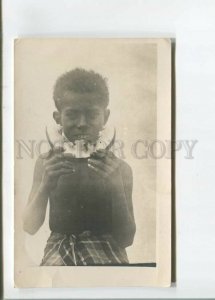 472847 Malaysia Sandokan boy eating local fruit Vintage photo postcard