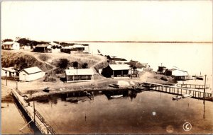 Real Photo Postcard Homes Along The Water in Caimanera, Cuba