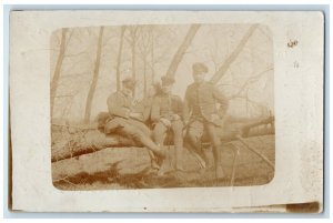 1916 Candid WWI Soldiers Resting On Tree Germany RPPC Photo Posted Postcard 
