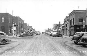 Chamberlain SD Street View Store Fronts Old Cars RPPC Postcard