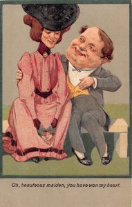 L043 Large head couple caricature 1910 comic humor embossed vintage postcard