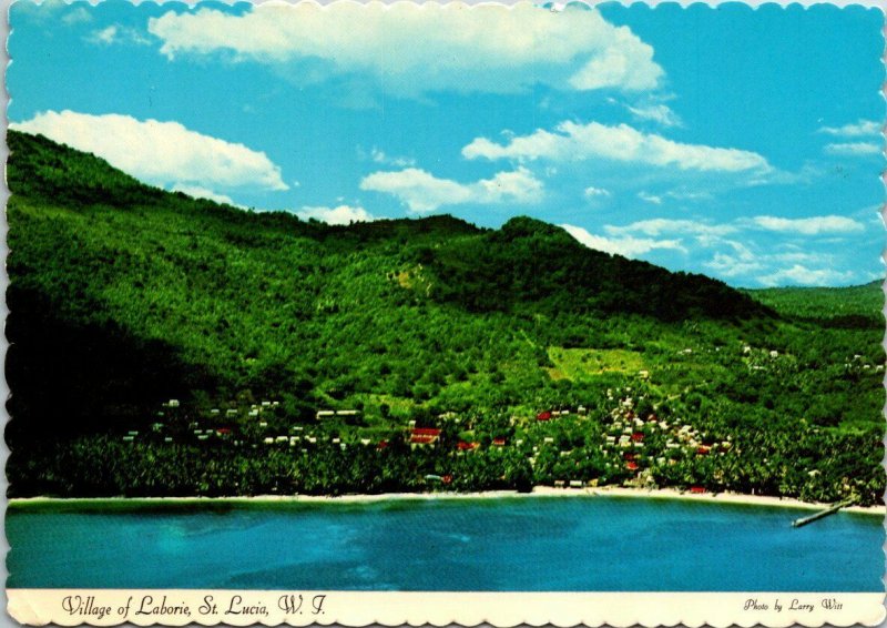 VINTAGE CONTINENTAL SIZE POSTCARD VILLAGE OF LABORIE ST. LUCIA LOADED STAMPS