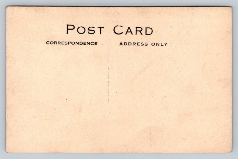 RPPC  The Boston Store  Massachusetts  Men on Bikes  c1910  Postcard