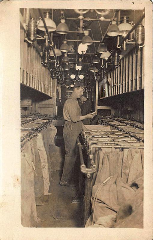 Sorting The U. S. Mail RPO Post Office Railroad Car Interior RPPC Postcard