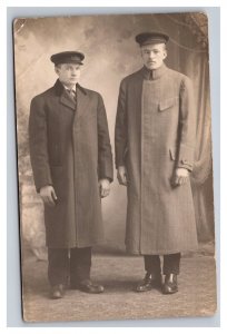 Vintage 1910's RPPC Postcard Studio Portrait Two Men All Black Long Coats Hats