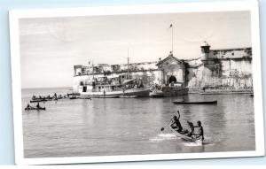 Kids in Canoes Boat Ship Cartagena Columbia RPPC Vintage Real Photo Postcard C77