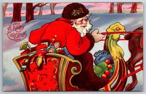 Christmas~Santa Claus In Sleigh Full Of Toys Holds Reins~Art Deco~Embossed~1910