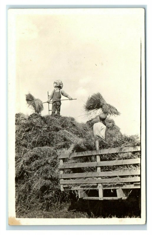 Postcard Men Stacking Hay on Cart forks overalls RPPC MA20