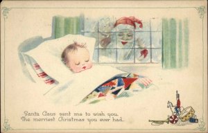 Santa Claus Looks in on Sleeping Baby 1921 Christmas Seal Vintage Postcard