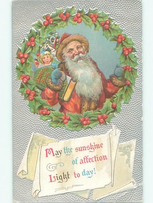 Pre-Linen christmas SANTA CLAUS CARRYING HIS ADDRESS BOOK W7118